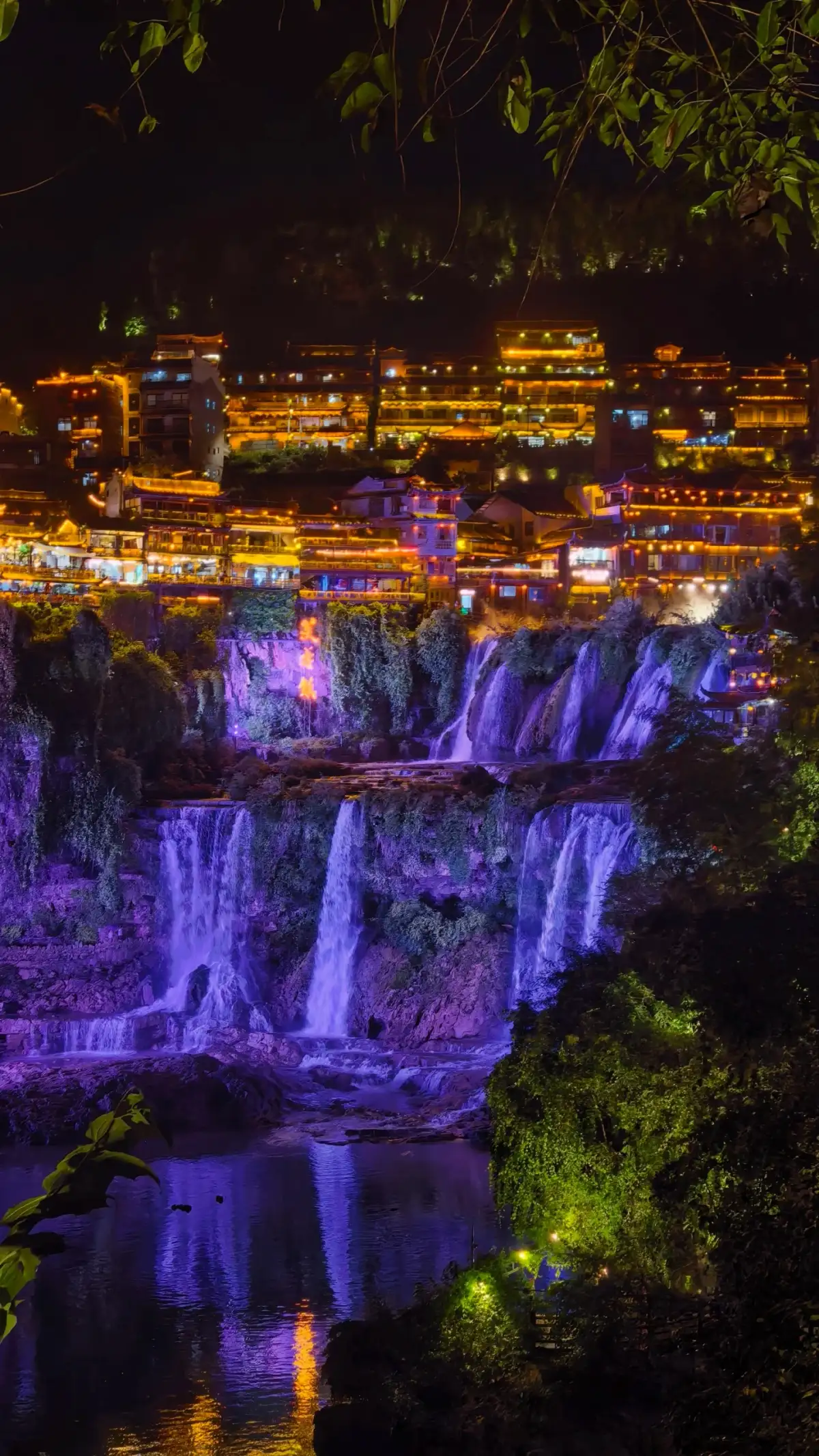 Furong Town’s waterfall and nighttime lighting