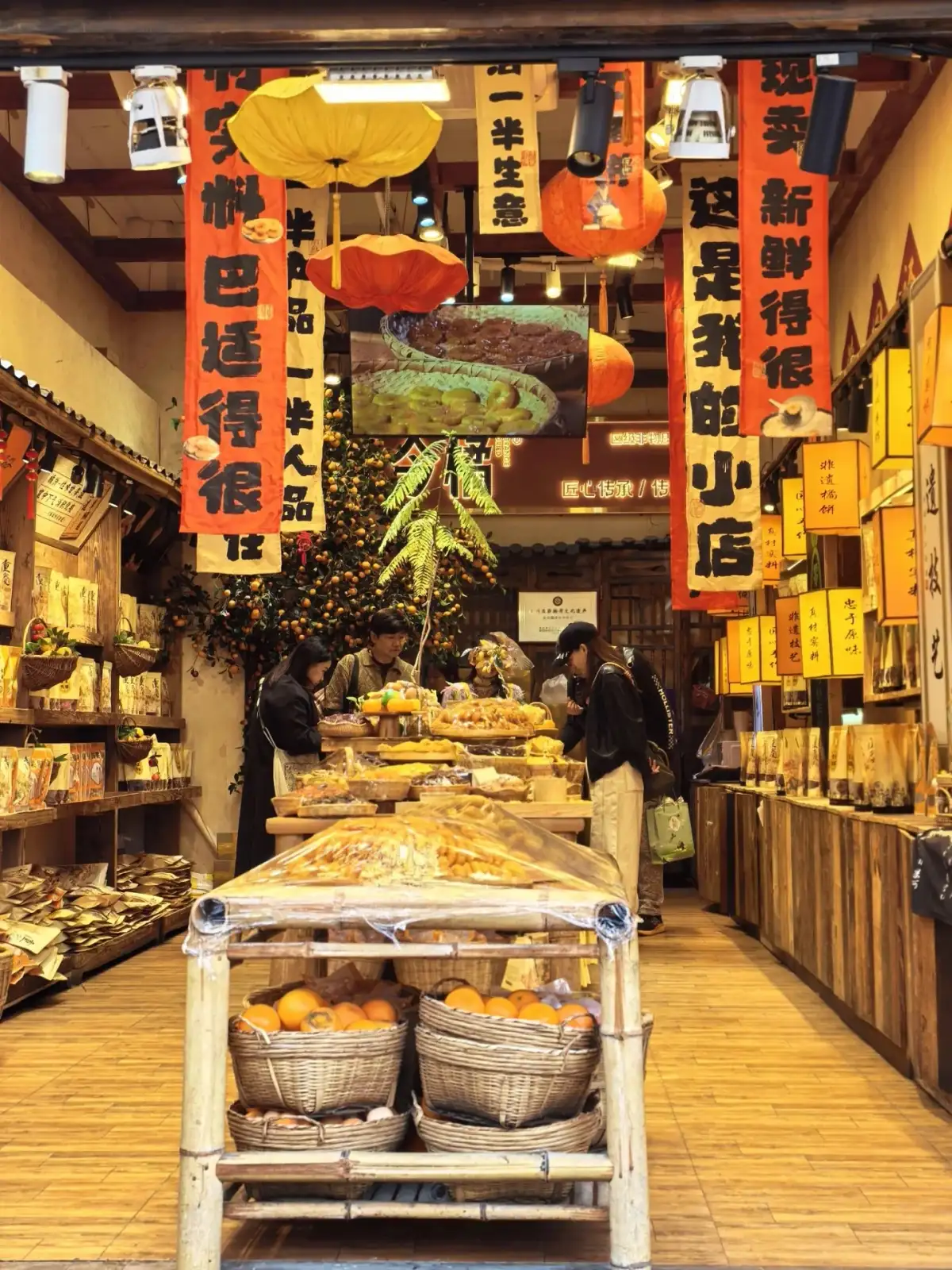 wooden shelves and the backs of customers inside the store