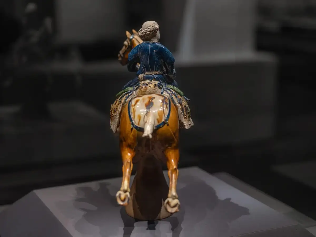 The back of the equestrian ceramic sculpture and the horse’s tail
