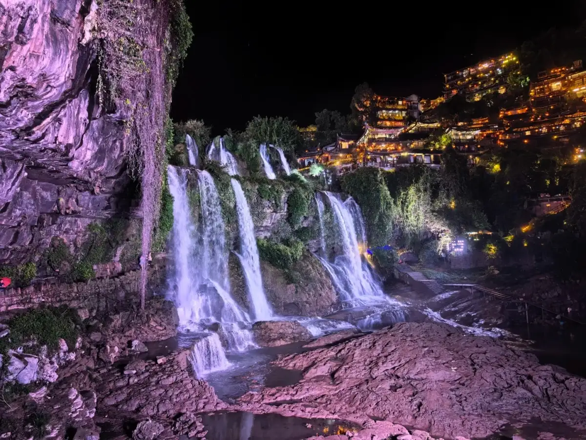 The lights along the waterfall boardwalk in Furong Town
