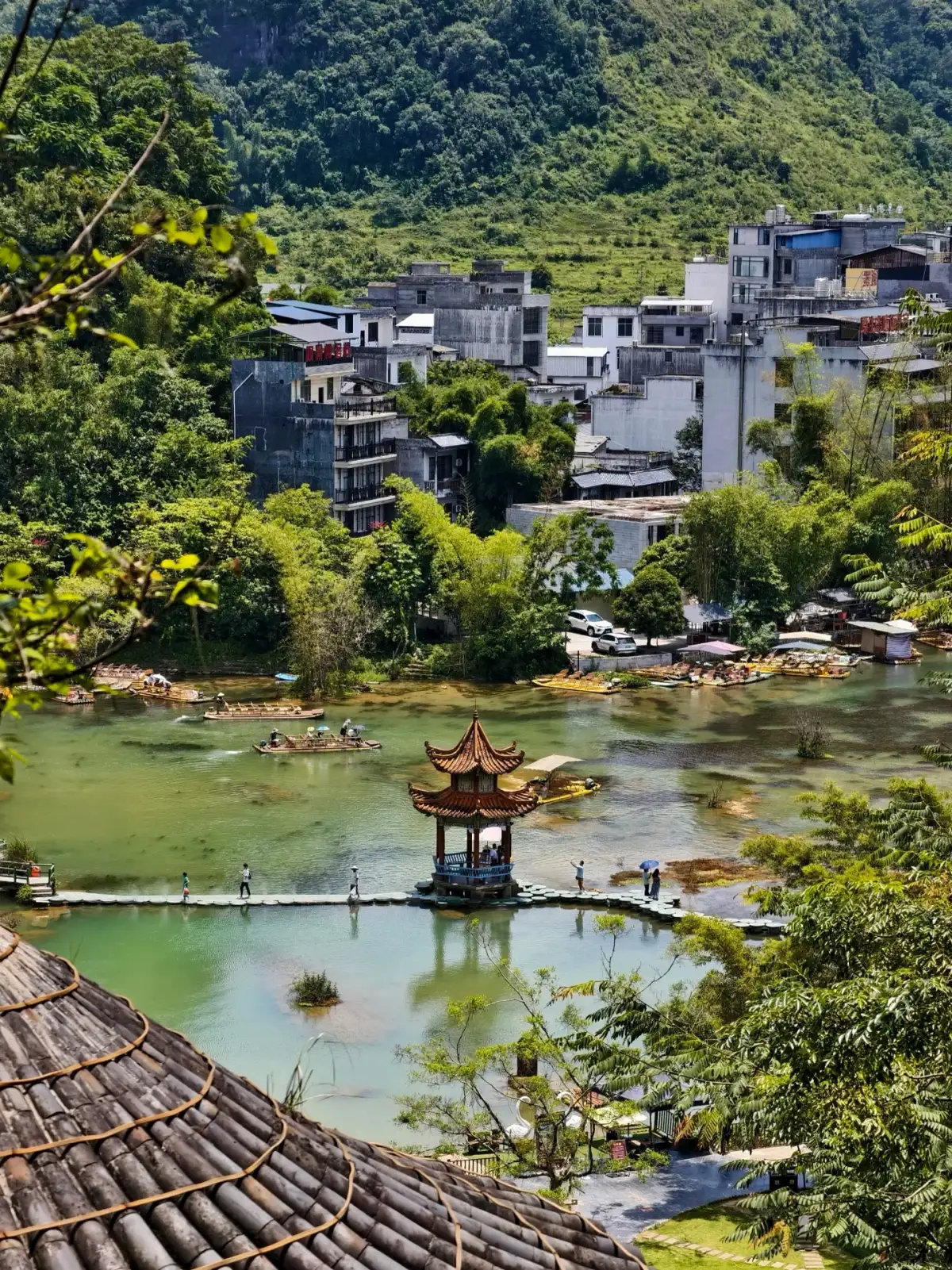 Viewing the small pavilion on the water at Equan and the village houses along the shore from a high vantage point