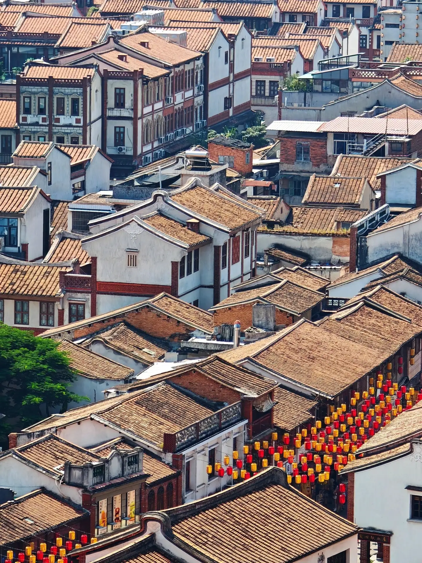 The interconnected rooftops and red lanterns of Zhangzhou’s ancient city
